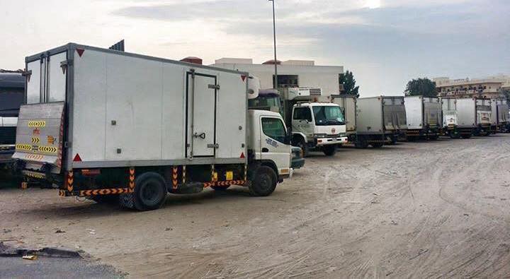 Refrigerated truck on a Dubai highway delivering chilled goods